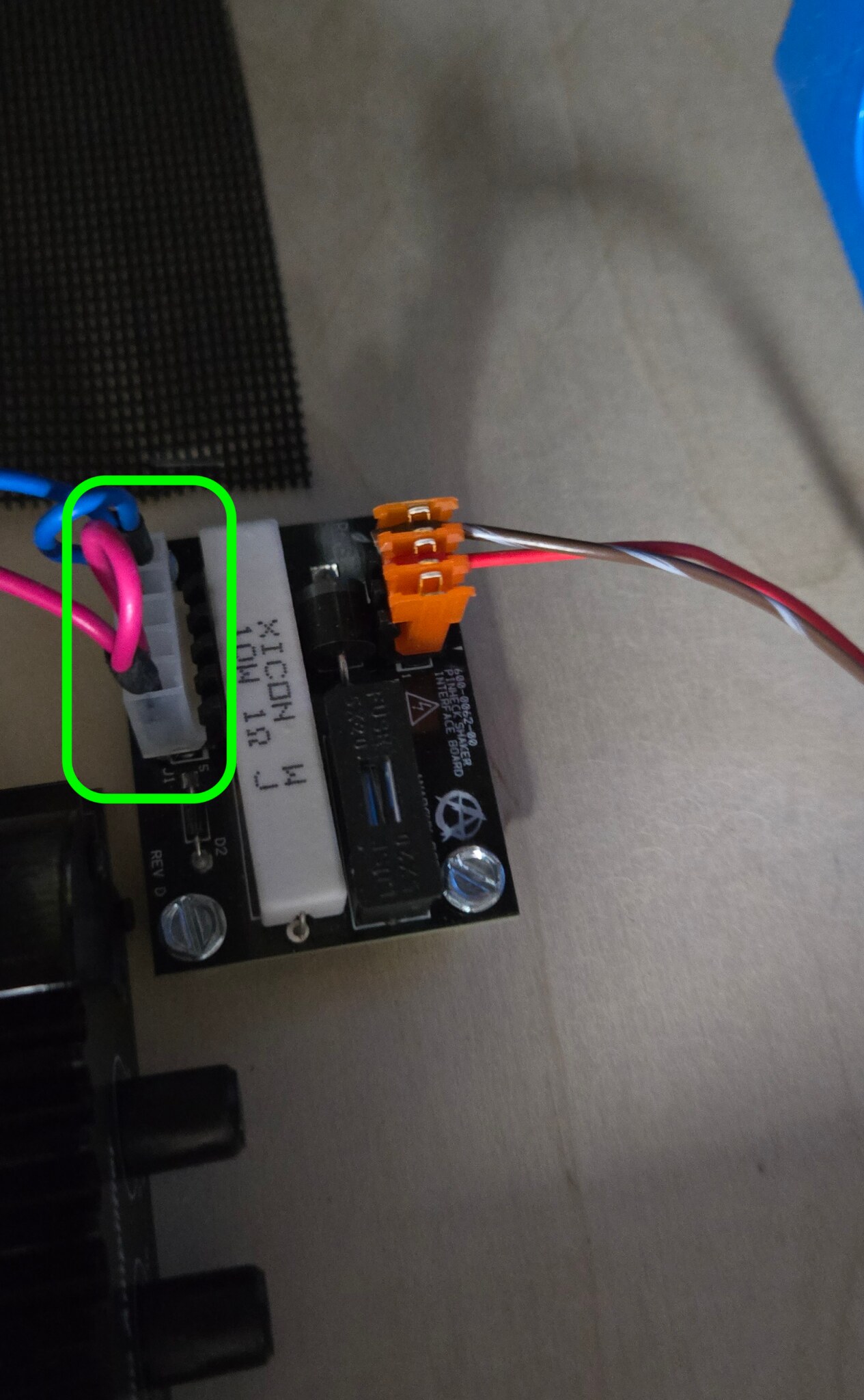 Shaker motor connector with red and blue wires in the Evil Dead cabinet