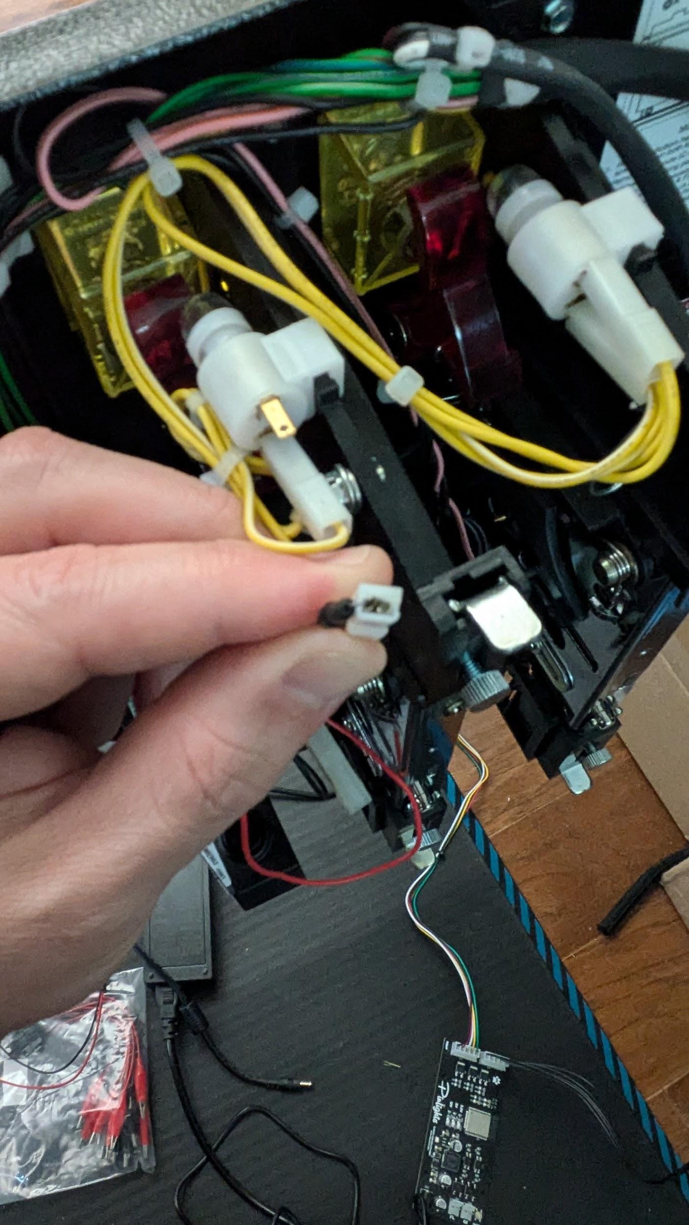 Wire tap installed on the front of a JJP coin door bulb