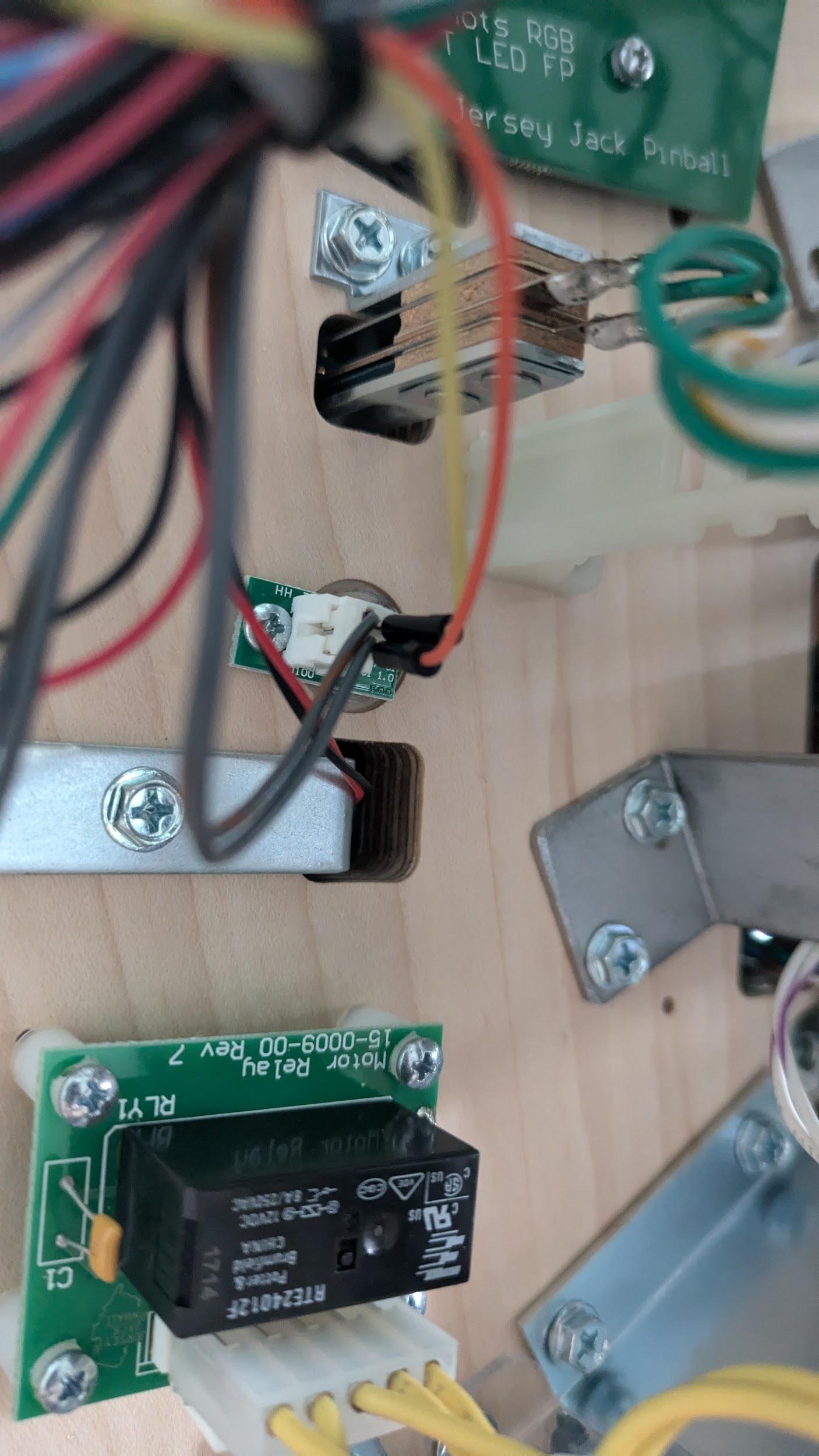 Wire taps connected to a JJP GI bulb connector under the playfield